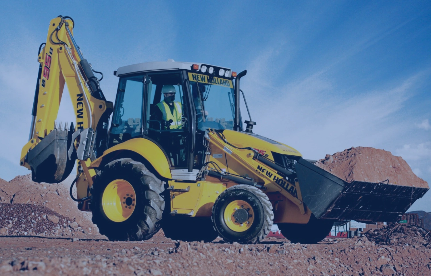 Imagem de retroescavadeira trabalhando